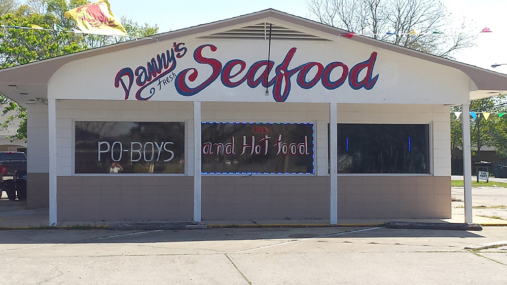 Photo of storefront with sign that says Danny's Fresh Seafood